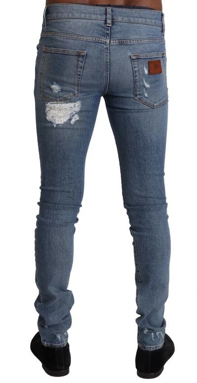 Dolce & Gabbana Light Blue Tattered Cotton Denim Skinny Jeans In Blue
