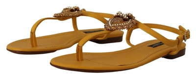 Shop Dolce & Gabbana Mustard T-strap Flat Sandals With Heart Women's Embellishment In Yellow