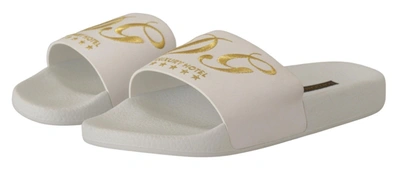 Shop Dolce & Gabbana Chic White Leather Slides With Gold Men's Embroidery