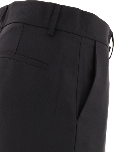 Shop Dolce & Gabbana Technical Fabric Pants With Metal Dg Logo