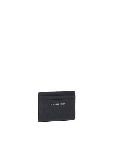 Shop Michael Michael Kors Hudson Grained Leather Bifold Wallet In Black