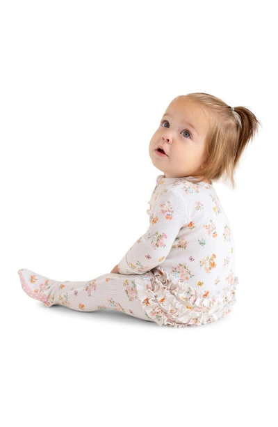 Shop Posh Peanut Clemence Floral Print Ruffle Fitted Footie Pajamas In Ivory/ Flowers