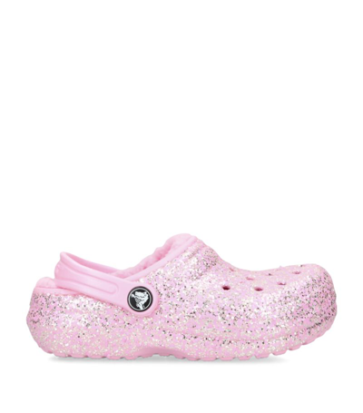 Shop Crocs Glitter Classic Clogs In Pink