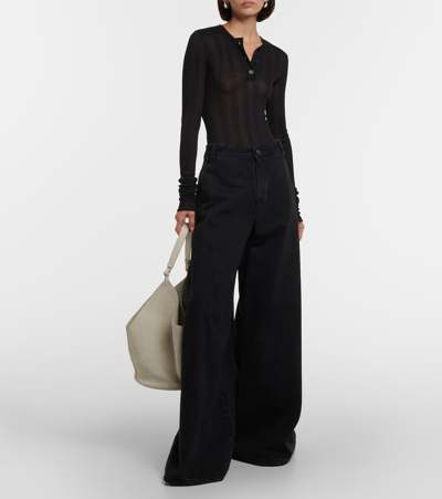 Shop Khaite Jacob Low-rise Wide-leg Jeans In Black