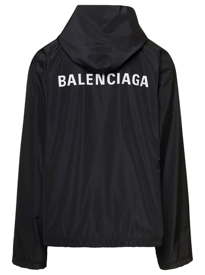 Shop Balenciaga Black Hooded Windbreaker With Contrasting Logo Print At The Back In Polyester Blend Man