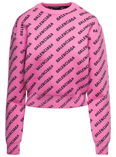 Shop Balenciaga Pink Cropped Sweater With All-over Mini Logo In Cotton And Wool Blend Woman