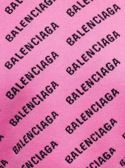 Shop Balenciaga Pink Cropped Sweater With All-over Mini Logo In Cotton And Wool Blend Woman