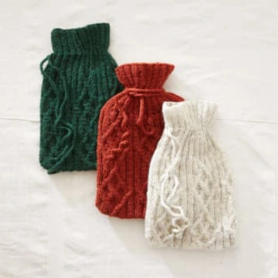Shop Aura Que Tamasi Cable Knit Hot Water Bottle Cover. In Green