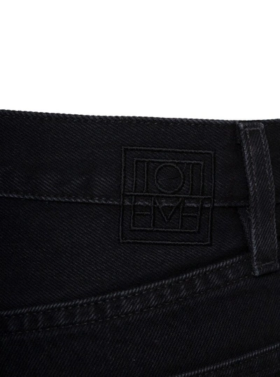 Shop Totême Straight Leg Jeans In Black Cotton