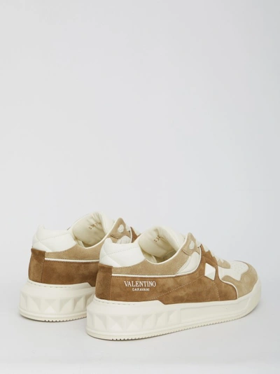 Shop Valentino One Stud Sneakers In Brown