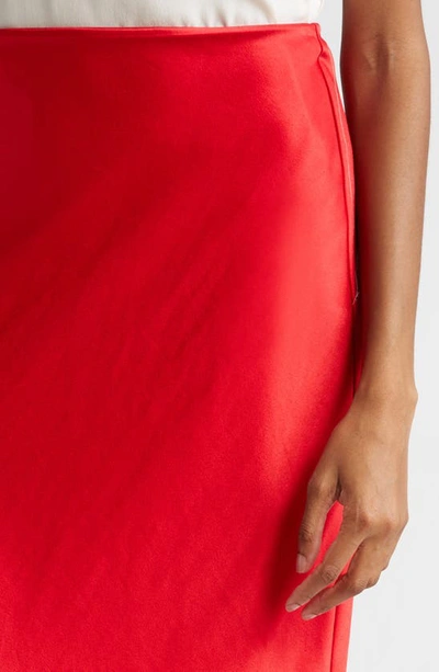 Shop Alice And Olivia Maeve Satin Midi Skirt In Red