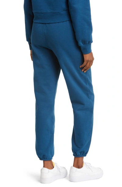 Shop Beyond Yoga On The Go Cotton Blend Joggers In Blue Gem