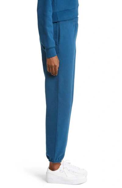 Shop Beyond Yoga On The Go Cotton Blend Joggers In Blue Gem