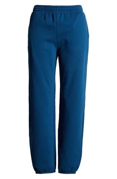 Shop Beyond Yoga On The Go Cotton Blend Joggers In Blue Gem