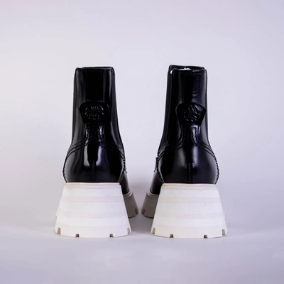 Shop Alexander Mcqueen Black Leather White Sole Chelsea Women's Boots
