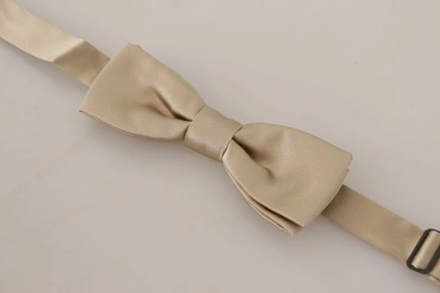 Shop Dolce & Gabbana Dazzling Gold Silk Bow Men's Tie