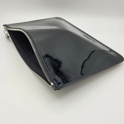 Alexander Mcqueen Women's Black Patent Leather Skull Charm Large Pouch In Black