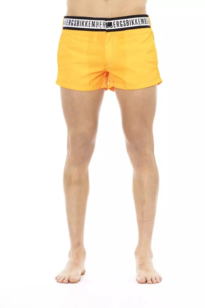 Shop Bikkembergs Elegant Orange Swim Shorts With Branded Men's Band