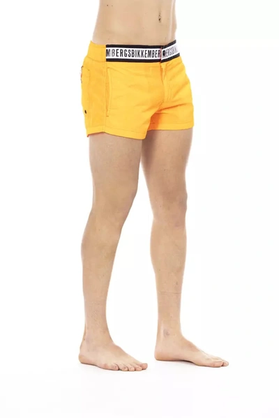 Shop Bikkembergs Elegant Orange Swim Shorts With Branded Men's Band