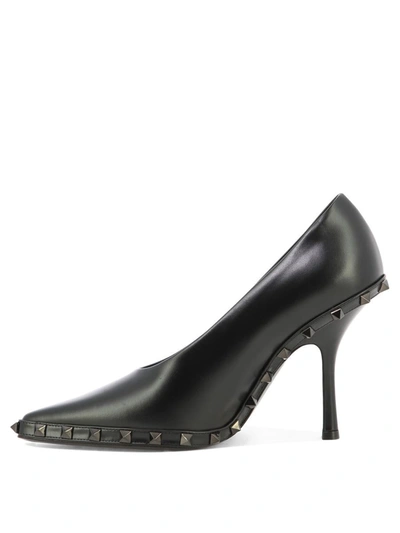 Shop Valentino Garavani "rockstud" Pumps In Black