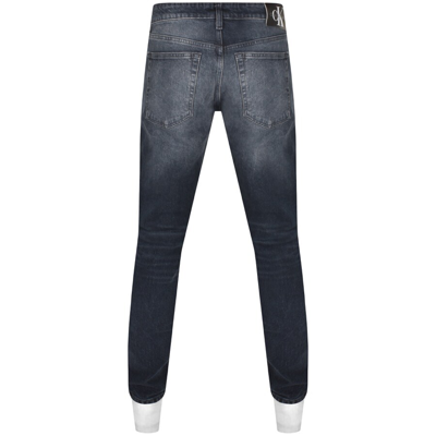 Shop Calvin Klein Jeans Mid Wash Jeans Blue