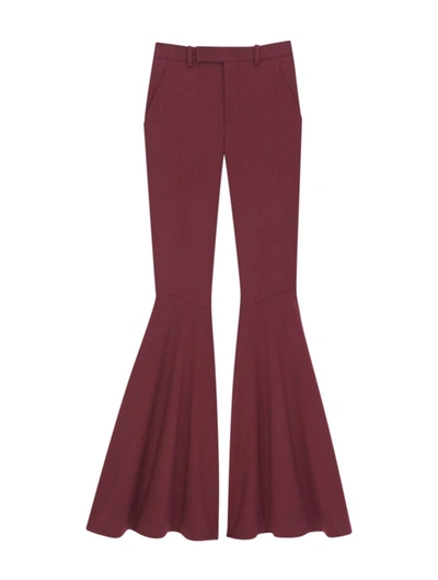 Shop Saint Laurent Flared Pants In Red
