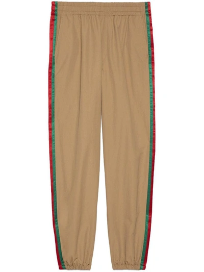 Shop Gucci Gg Supreme Nylon Joggers In Green