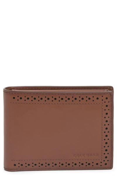 Cole Haan Brogue Leather Passcase In Cognac