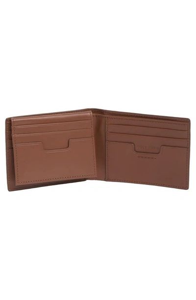 Cole Haan Brogue Leather Passcase In Cognac
