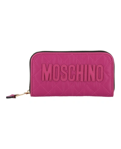 Shop Moschino Quilted Logo Zip Wallet In Pink