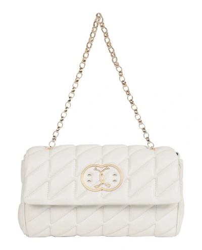 Shop Moschino Quilted Shoulder Bag In White