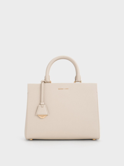 Shop Charles & Keith Mirabelle Structured Top Handle Bag In Ivory