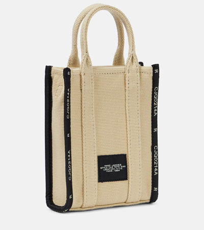 Shop Marc Jacobs The Jacquard Canvas Phone Pouch In Beige