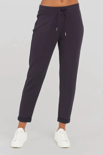 Shop Spanx Airessentials Tapered Pant In Classic Navy In Blue