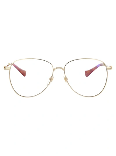 Shop Gucci Sunglasses In 004 Gold Gold Transparent