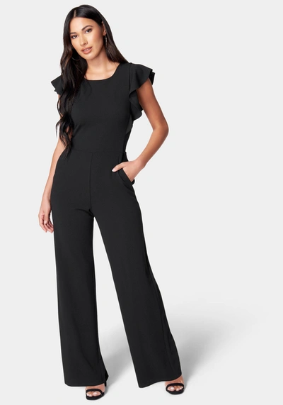 Shop Bebe Flutter Sleeve Core Jumpsuit In Black