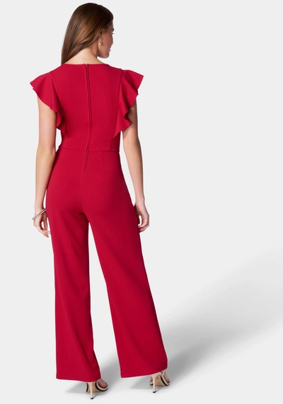 Bebe Flutter Sleeve Core Jumpsuit In Red