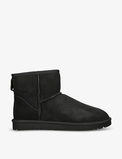 Shop Ugg Classic Mini Sheepskin Boots In Black