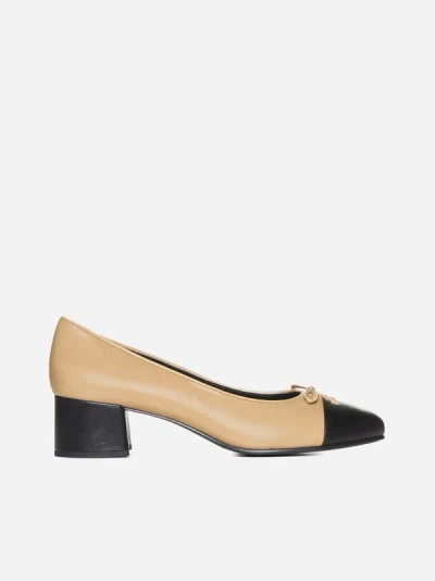 Shop Tory Burch Bow Leather Pumps In Ginger Shortbread,black