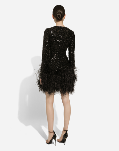 Shop Dolce & Gabbana Short Sequined Dress With Feather Trim In Black