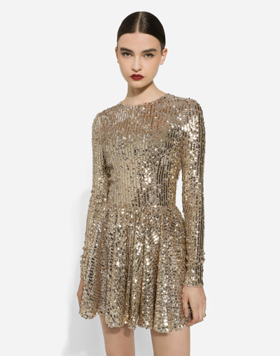 Shop Dolce & Gabbana Short Sequined Dress With Circle Skirt In Gold