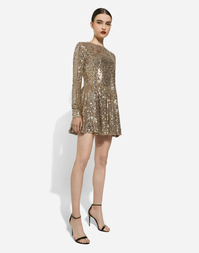 Shop Dolce & Gabbana Short Sequined Dress With Circle Skirt In Gold