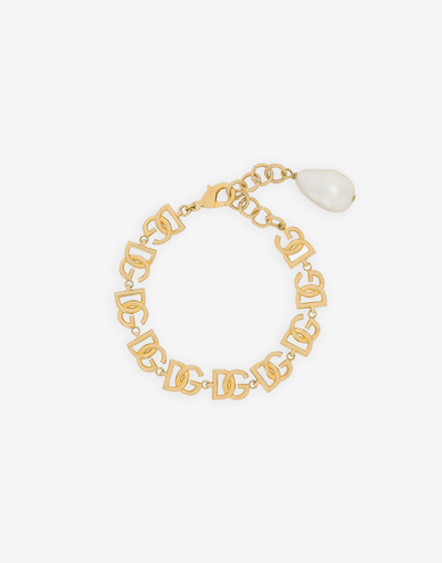 Shop Dolce & Gabbana Bracelet With Multiple Dg Logos In Gold