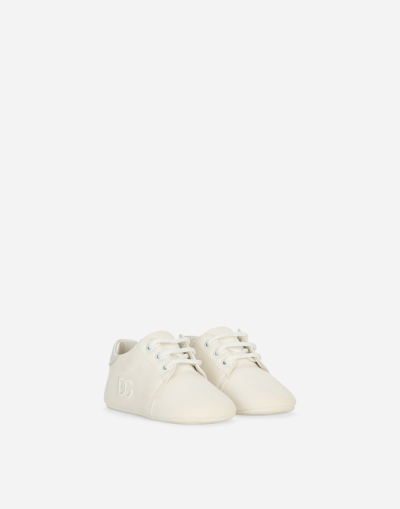 Shop Dolce & Gabbana Suede Slippers In White