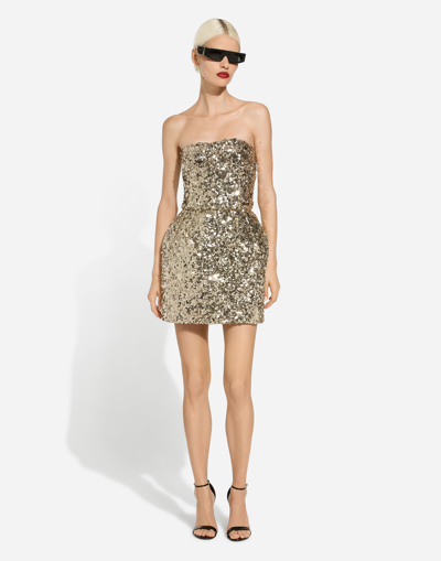 Shop Dolce & Gabbana Short Sequined Strapless Dress In Gold