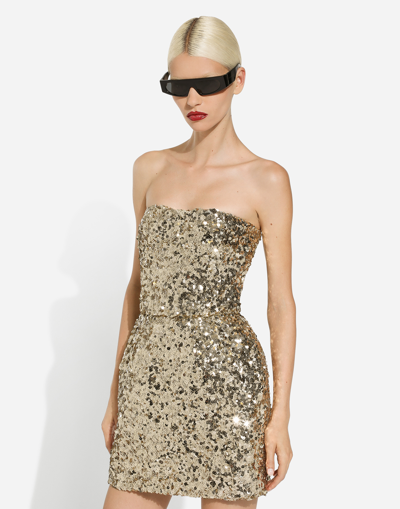 Shop Dolce & Gabbana Short Sequined Strapless Dress In Gold