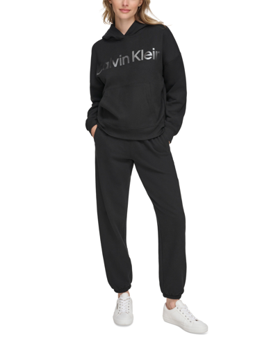 Shop Calvin Klein Women's Metallic-logo Dropped-shoulder Hoodie In Black