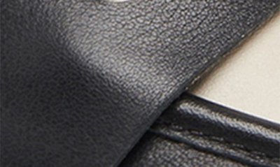 Dolce Vita Moyra D'orsay Penny Loafer In Black/ White Leather