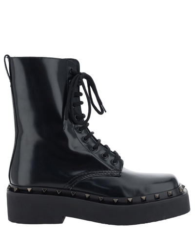 Shop Valentino Rockstud Combact Lace-up Boots In Black