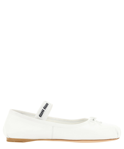 Shop Miu Miu Ballet Flats In White